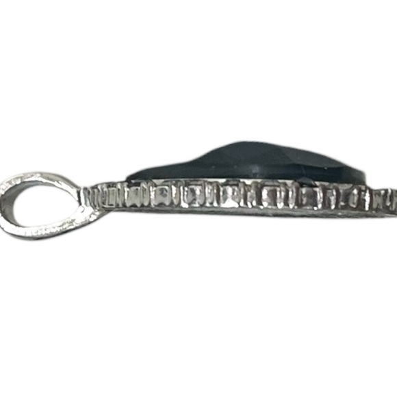 Vintage teardrop shaped pendant surrounded by small stones in polished metal - Picture 2 of 6